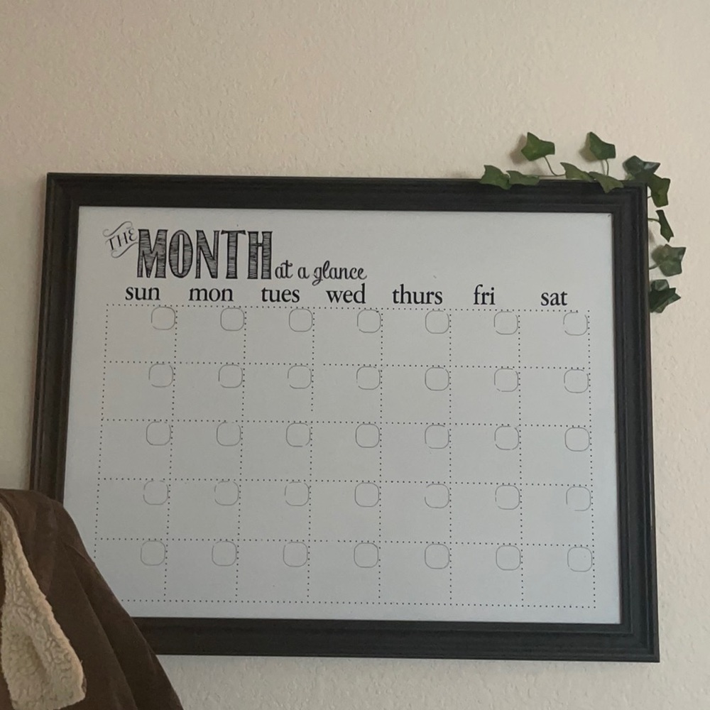 very cute black and white hanging calendar.